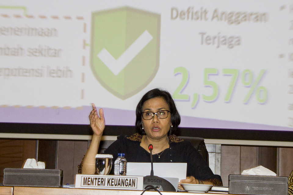 Finance Minister Sri Mulyani Indrawati announced Indonesia's unaudited 2017 budget deficit on Tuesday (02/01). (Antara Photo/Galih Pradipta)