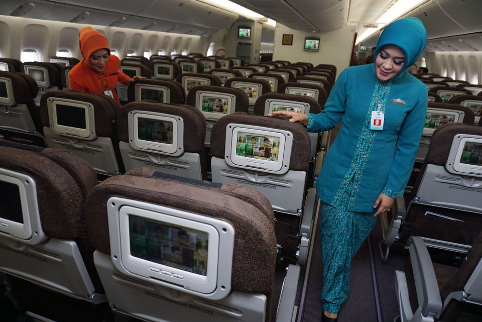 Authorities in Aceh have ordered Muslim flight attendants to wear headscarves when flying into the ultra-conservative Islamic province. (Antara Photo/Lucky R.)