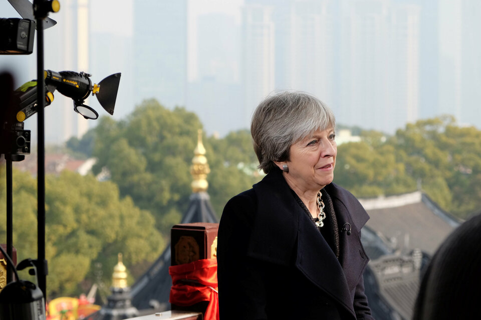 British Prime Minister Theresa May landed in China earlier this week fending off questions about her future amid mounting accusations of poor leadership, boring policies, and weakness over Brexit. (Reuters Photo/William James)