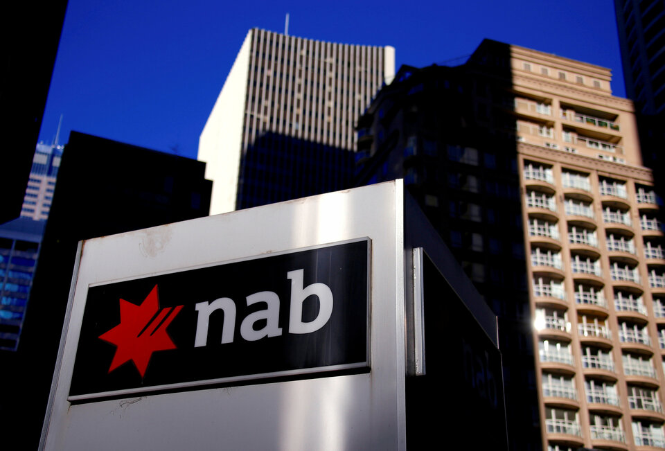 The logo of the National Australia Bank is displayed outside its headquarters building in central Sydney, Australia. (Reuters Photo/David Gray)