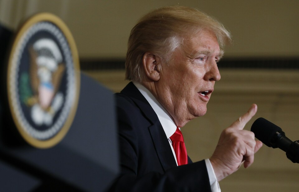 The United States said on Friday (23/02) that it was imposing its largest package of sanctions to pressure North Korea to give up its nuclear missile program, and President Donald Trump warned of a 'phase two' that could be 'very, very unfortunate for the world' if the steps did not work. (Reuters Photo/Kevin Lamarque)
