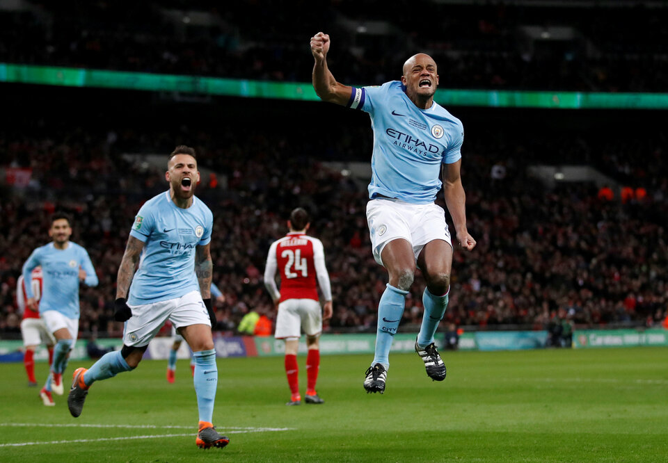Manchester City's Vincent Kompany celebrates scoring his side's second goal against Arsenal in the Carabao Cup Final at Wembley Stadium in London on Sunday (25/02). (Reuters Photo/Carl Recine)