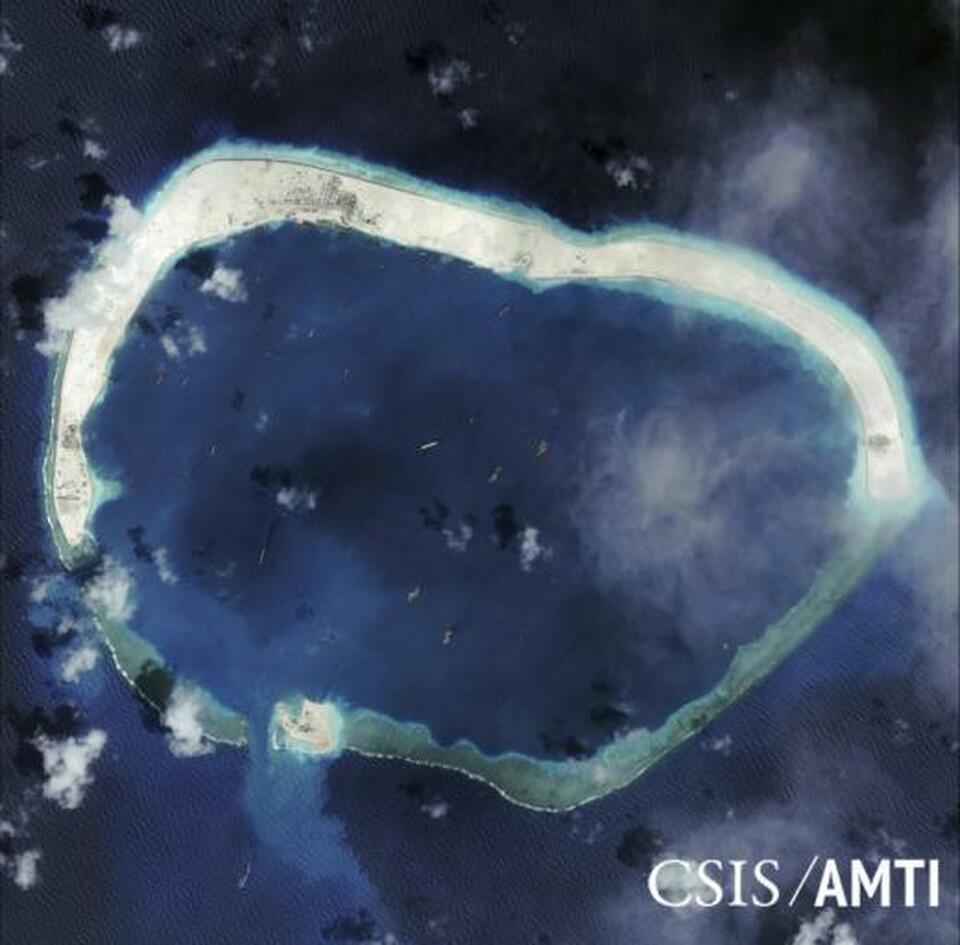 The Philippines may lodge a protest with China against the reported presence of two military aircraft on  Mischief Reef, a Chinese-built island in the South China Sea, amid concern that China is militarizing the waterway. (Reuters Photo/CSIS Asia Maritime Transparency Initiative)