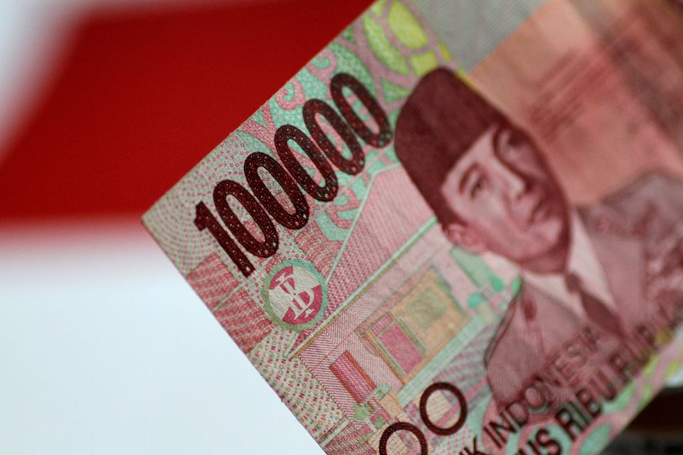 The central bank intervened to defend the rupiah on Monday (13/08) after the currency fell amid a wider emerging market sell-off, a senior official said. (Reuters Photo/Thomas White)