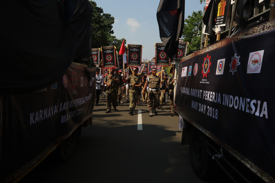 Thousands of workers walked to the state palace during May Day 2018 in Jakarta, Tuesday (1/5). JG Photo / Yudhi Sukma Wijaya