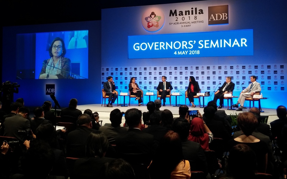 Asian Development Bank president Takehiko Nakao, third from left, and Indonesian Finance Minister Sri Mulyani Indrawati, second from left, participate in a panel discussion during the ADB Governors' Seminar in Manila on Friday (04/05). (JG Photo/Amal Ganesha)