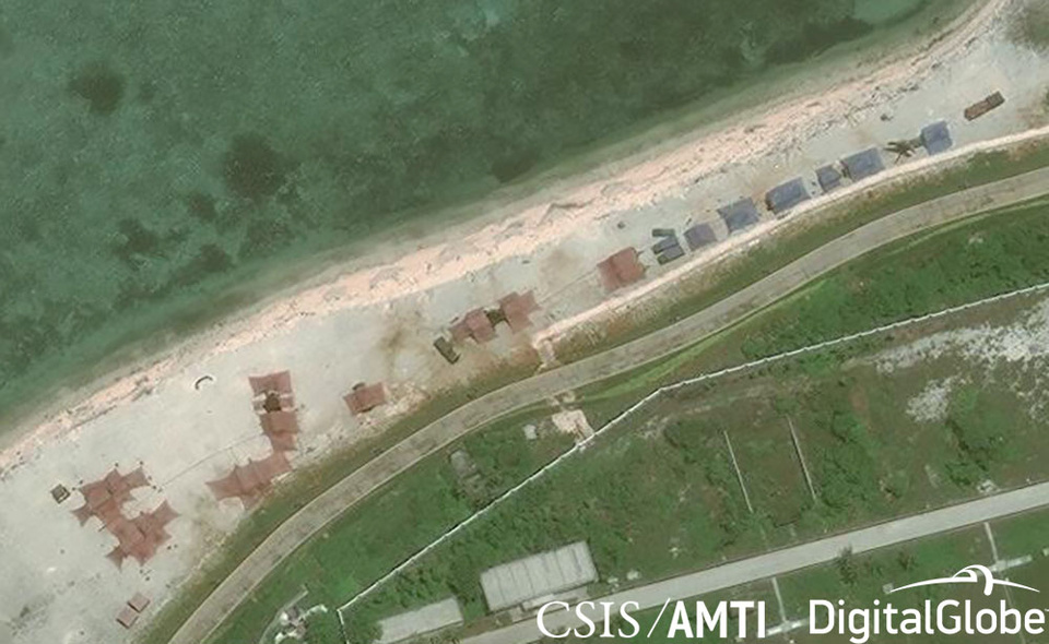 Satellite imagery shows what the CSIS Asia Maritime Transparency Initiative describes as the deployment of several new weapons systems to China’s base on Woody Island in the South China Sea in this May 12, 2018 file photo. (Reuters Photo/CSIS Asia Maritime Transparency Initiative)