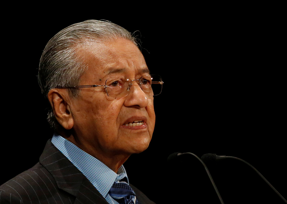 Malaysia will reopen its embassy in Pyongyang, Prime Minister Mahathir Mohamad has said, suggesting an end to the diplomatic row over the assassination of North Korean leader Kim Jong-un's half-brother in Kuala Lumpur last year.  (Reuters Photo/Issei Kato)
