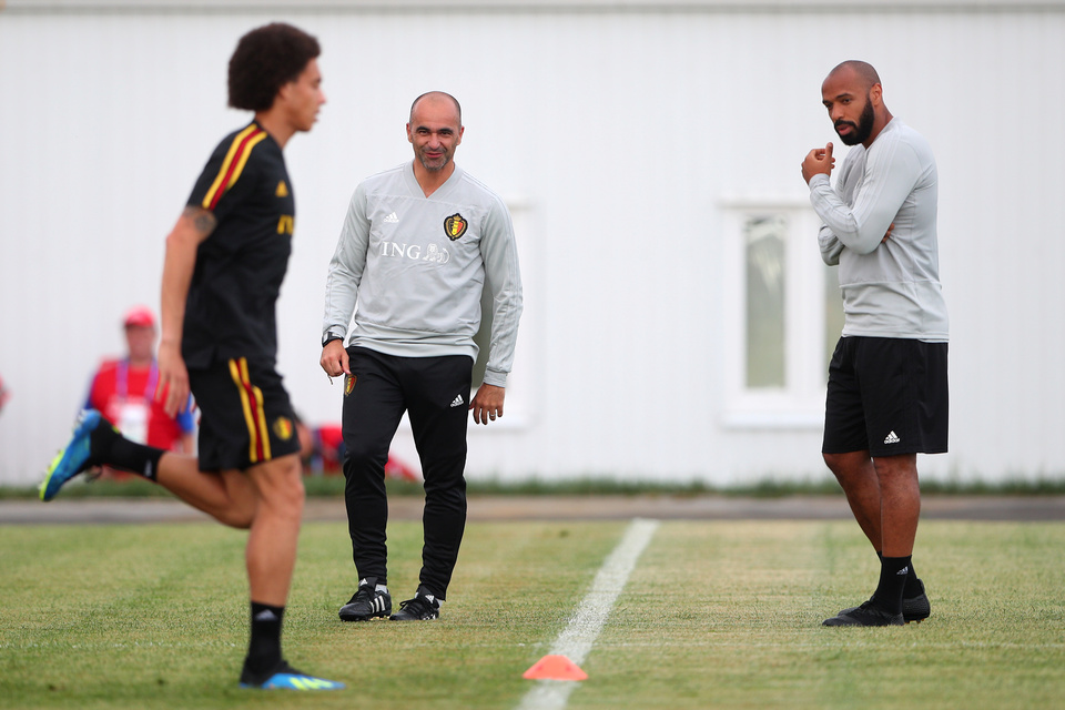 Belgium's assistant coach Thierry Henry, right, with coach Roberto Martinez, center, and Axel Witsel during training. (Reuters Photo/Hannah McKay)