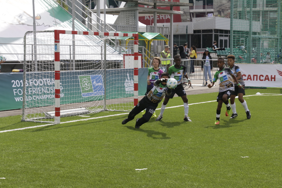 Muhammad Raffa Yasin Casillas makes a save during the match against Capuchin in the Gazprom International Children’s social programee Football for Friendship at Moscow, on June 12.