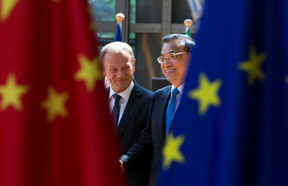 European Council President Donald Tusk and Chinese Premier Li Keqiang arrive to attend a EU-China Summit in Brussels in this June 2017 file photo. (Reuters Photo/Virginia Mayo)