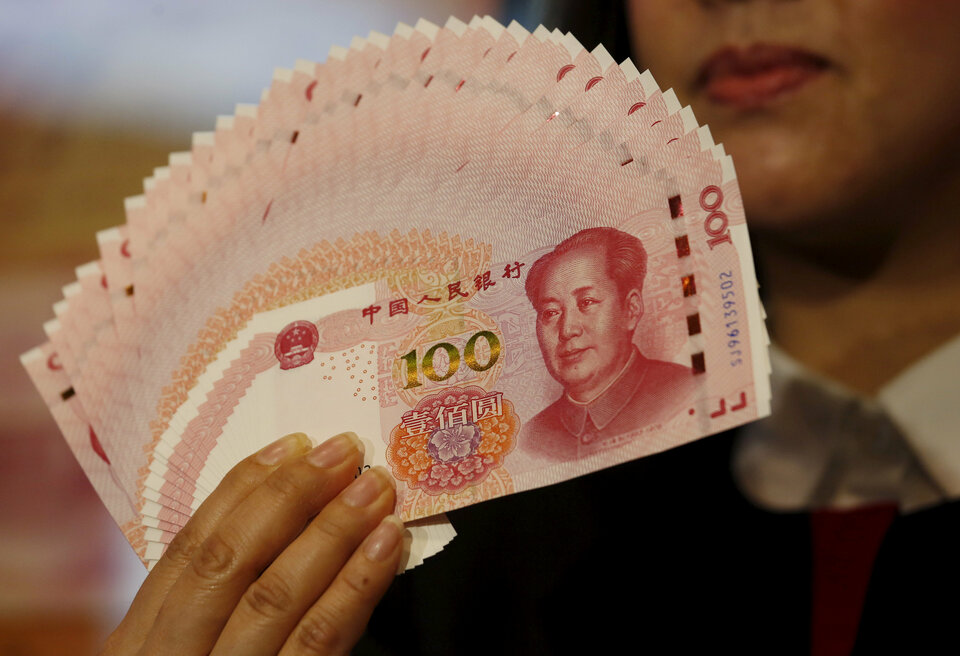 China's foreign-exchange regulator said on Thursday (19/07) it was well-equipped to keep currency markets stable amid intensifying trade frictions with the United States. (Reuters Photo/Bobby Yip)