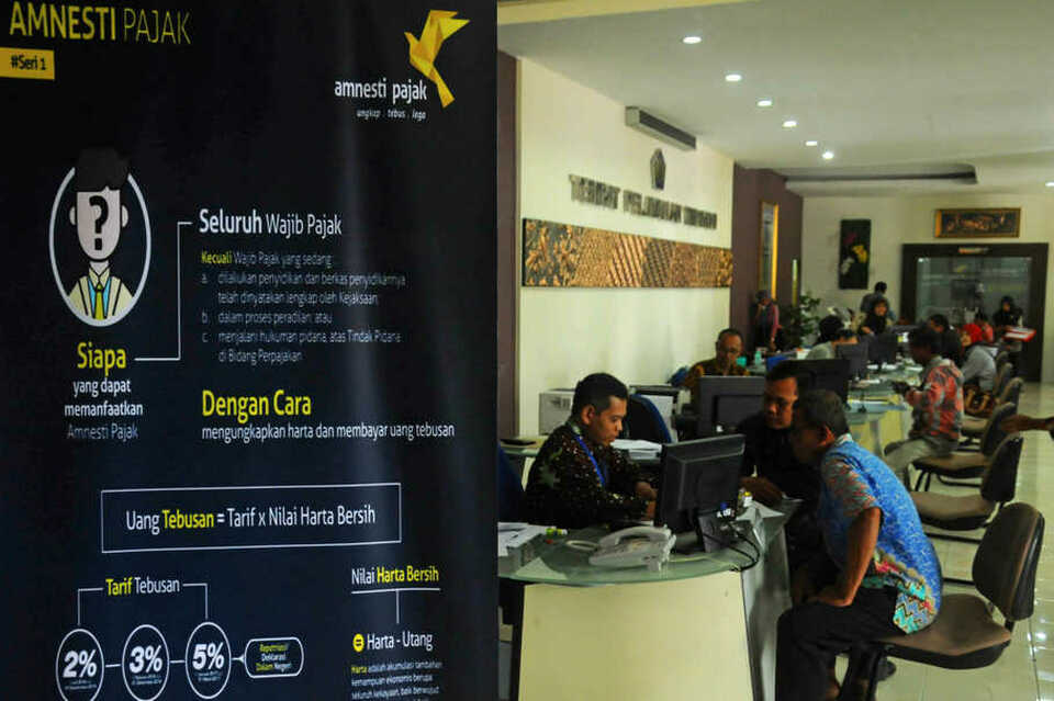 Indonesia has been trying to find more ways to improve tax compliance, including through the government's flagship tax amnesty program introduced in 2016. (Antara Photo/Aloysius Jarot Nugroho)