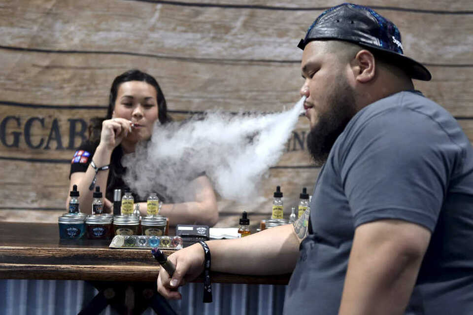 The Ministry of Finance estimates that the government may collect up to Rp 3 trillion ($207 million) in additional revenue next year from a new excise on tobacco extract, or vaping liquid, commonly used in electronic cigarettes. (Reuters Photo/David Becker)