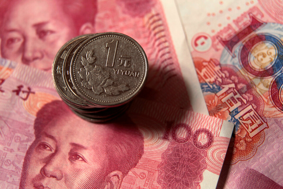 China's central bank said on Friday (10/08) it would maintain its prudent and neutral monetary policy to ensure ample liquidity and keep the yuan largely stable. (Reuters Photo/Petar Kujundzic)
