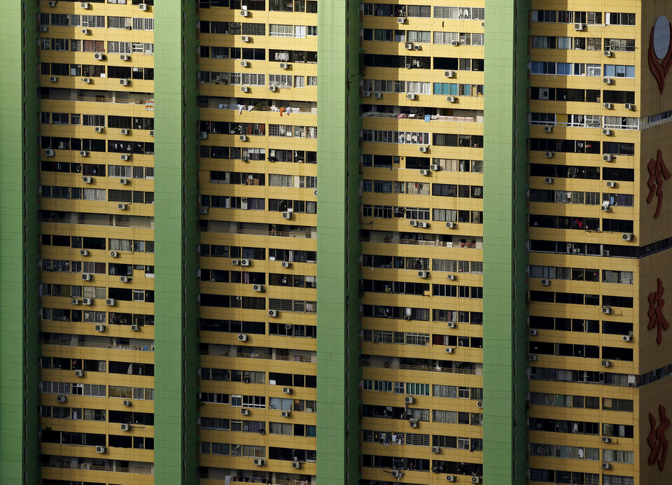 Air-conditioning units dot the facade of the People's Park Complex residential apartment in Singapore's Chinatown. (Reuters Photo/Edgar Su)