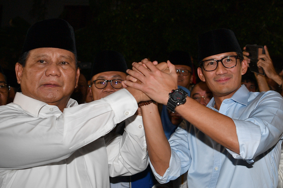Prabowo Subianto, left, and Sandiago Uno after announcing their candidacy in next year's presidential election on Thursday night (09/08). (Antara Photo/Sigid Kurniawan)