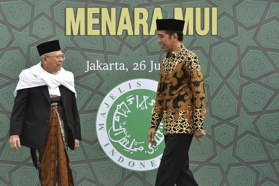 File photo: President Joko Widodo, right, and Ma'ruf Amin visit the construction site of the Indonesian Ulema Council (MUI) building in Jakarta on July 26, 2019. (Antara Photo)