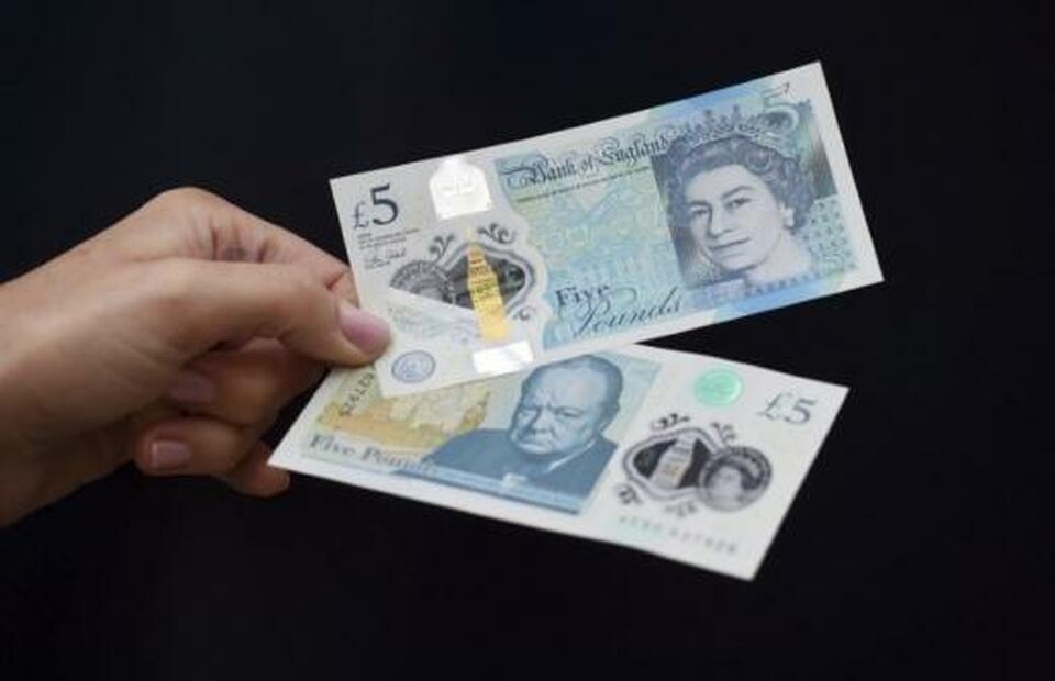 Having sunk to 13-month lows, sterling could fall by up to another 10 percent in the coming months should Britain crash out of the European Union without a deal on future trade ties, luring more speculators to bet against the currency. (Reuters Photo/Joe Giddens)