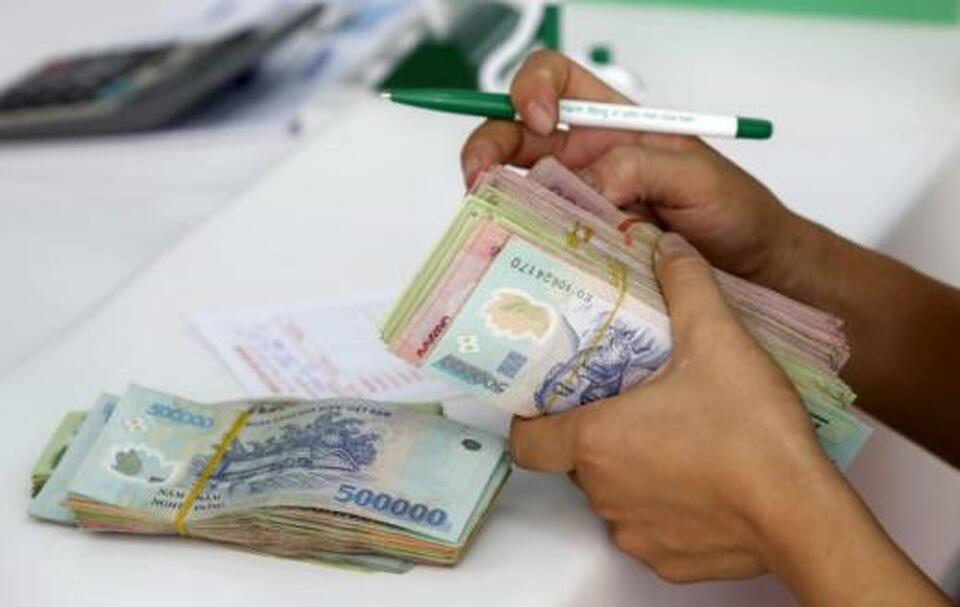 Vietnam will limit its devaluation of its dong currency at 2 percent this year and stick to its macroeconomic targets. (Reuters Photo/Kham)