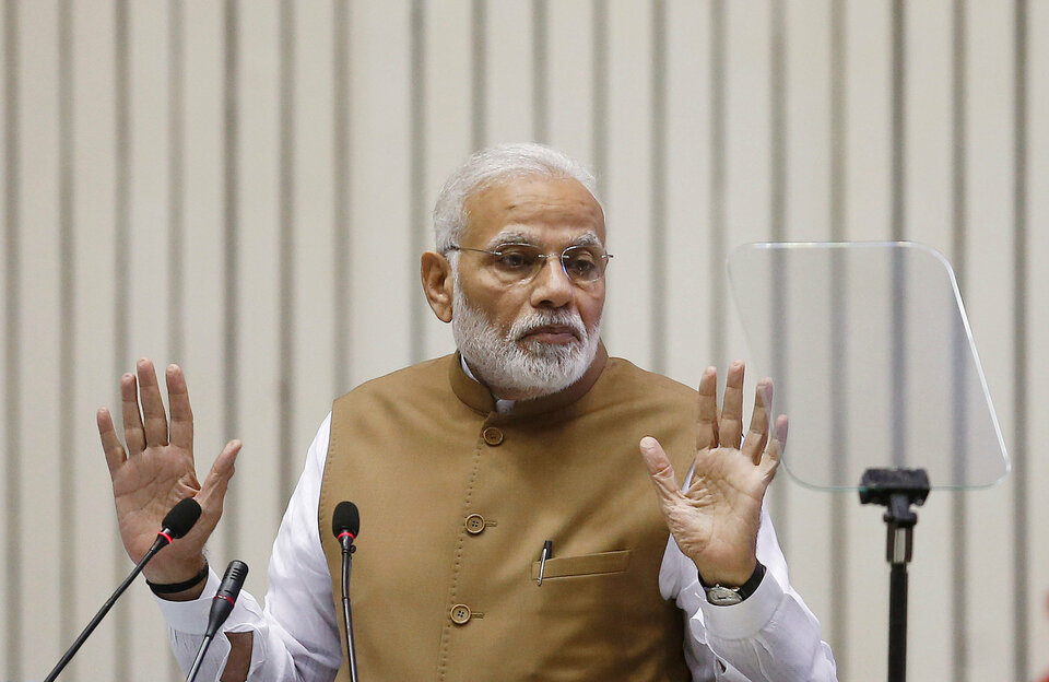 Indian Prime Minister Narendra Modi faced calls for his resignation over allegations of corruption in a military jet deal with France after former French President Francois Hollande was quoted as saying New Delhi had influenced the choice of a local partner. (Reuters Photo/Adnan Abidi)
