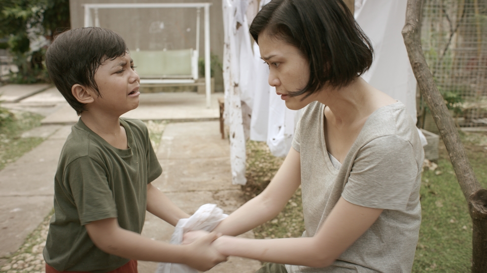 Muzakki Ramdhan as Jody, left, and Marissa Anita as Murni in 'A Mother's Love,' Joko Anwar's television film that forms part of HBO Asia's 'Folklore' anthology. (Photo courtesy of HBO Asia)