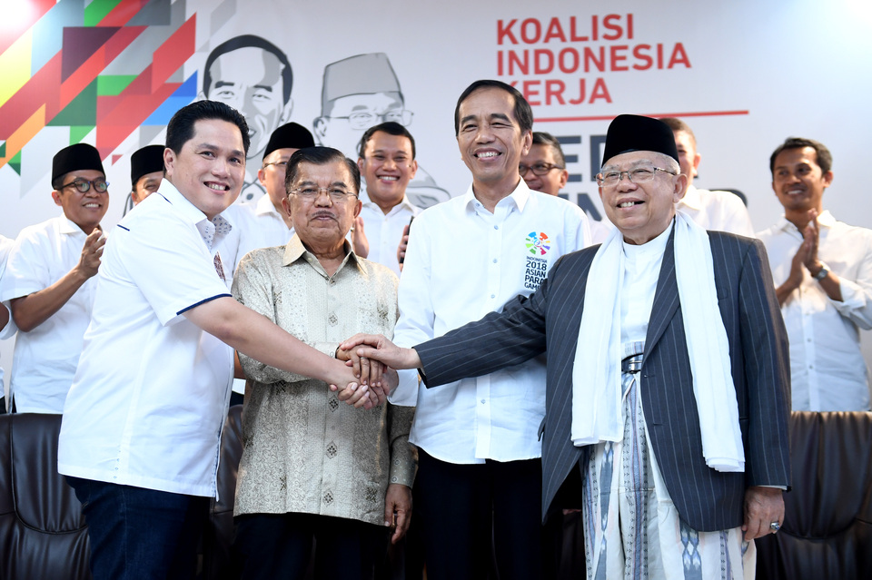 President Joko 'Jokowi' Widodo has appointed Erick Thohir, left, to lead his reelection campaign. (Antara/Photo/Akbar Nugroho Gumay)