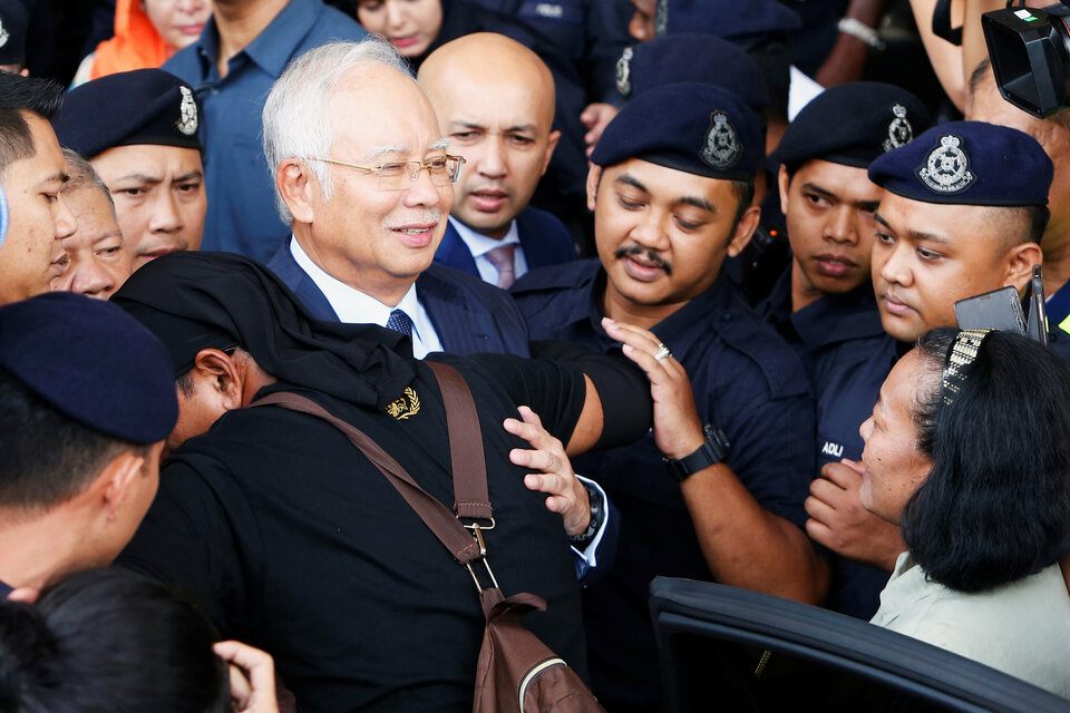Malaysia's former Prime Minister Najib Razak leaves a court in Kuala Lumpur, Malaysia on Oct. 4, 2018. (Reuters Photo/Lai Seng Sin)