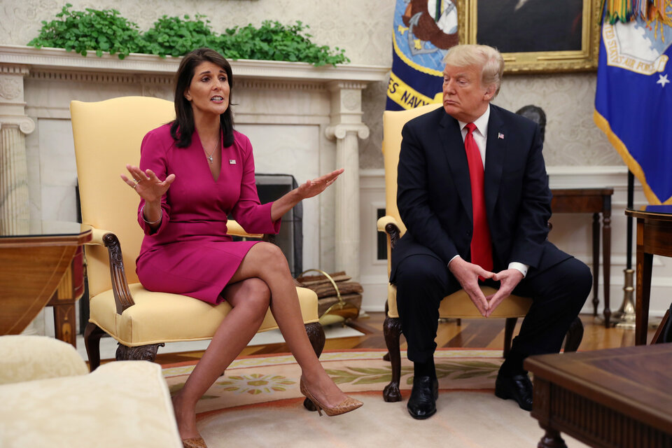 Outgoing United States Ambassador to the United Nations Nikki Haley talks with President Donald Trump in the Oval Office of the White House after he accepted her resignation in Washington, D.C., on Tuesday. (Reuters Photo/Jonathan Ernst)