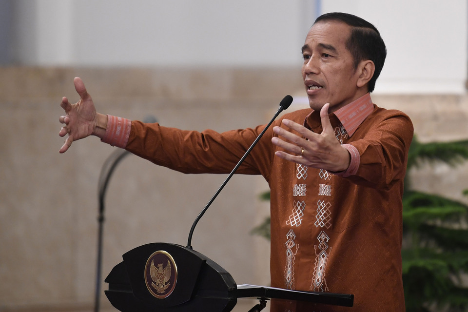 The Commission for Missing Persons and Victims of Violence (Kontras) said in a report last week that President Joko 'Jokowi' Widodo has not yet accomplished any of his 17 priority programs on human rights, which form part of his Nawa Cita agenda. (Antara Photo/Puspa Perwitasari)