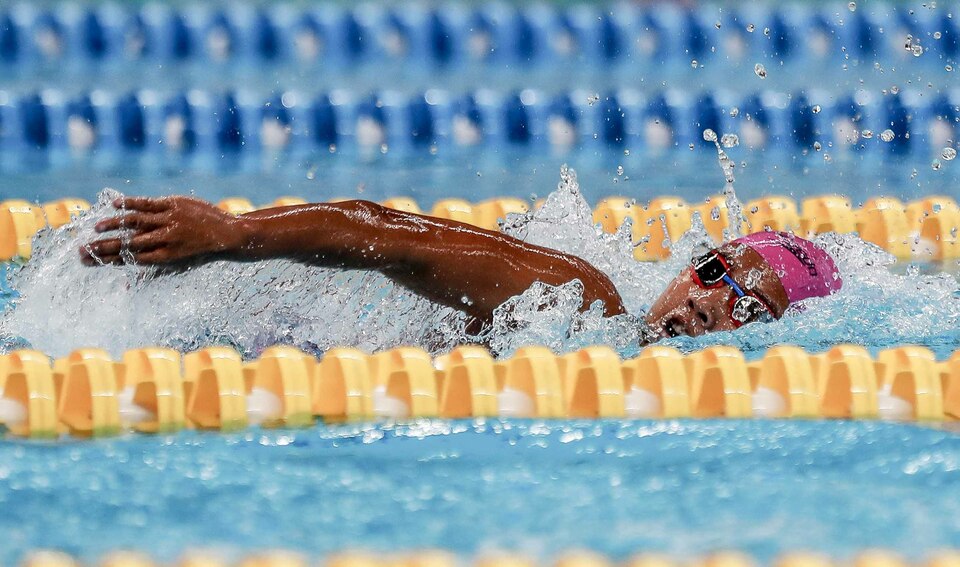 Swimmer Syuci Indriani added one more gold to Indonesia's medal tally by finishing first in the women's SB14 100-meter breaststroke at the 2018 Asian Para Games on Monday evening.(Photo courtesy of Inapgoc/Fernando Randy)
