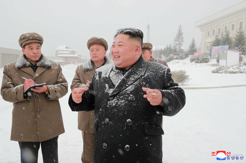 North Korean leader Kim Jong-un publicly inspected a new weapon for the first time in nearly a year, state media reported on Friday, while he also decided to release an American prisoner, sending conflicting signals at a time of sensitive negotiations. (Reuters Photo/KCNA)