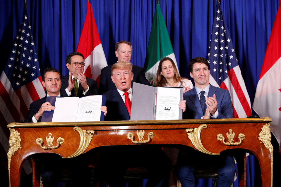 US President Donald Trump, Canada's Prime Minister Justin Trudeau and Mexico's President Enrique Pena Nieto attend the USMCA signing ceremony before the G20 leaders summit in Buenos Aires, Argentina November 30, 2018.  (Reuters Photo/Kevin Lamarque)