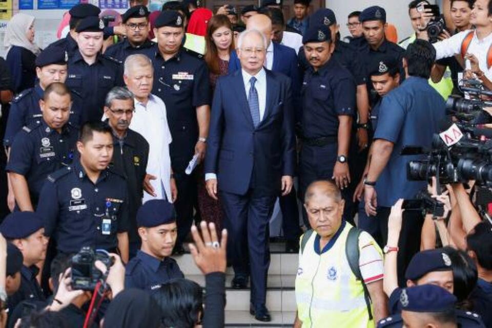 Malaysia's former Prime Minister Najib Razak leaves a court in Kuala Lumpur, Malaysia on Oct. 4, 2018. (Reuters Photo/Lai Seng Sin)