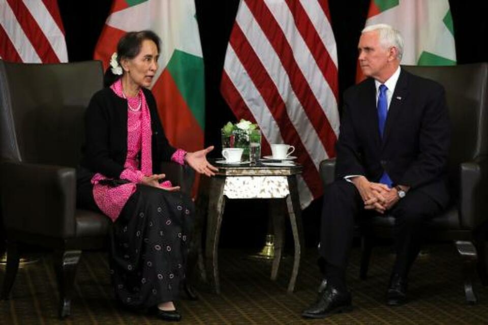 Myanmar's State Counselor Aung San Suu Kyi and US Vice President Mike Pence hold a bilateral meeting in Singapore on Wednesday. (Reuters Photo/Athit Perawongmetha)
