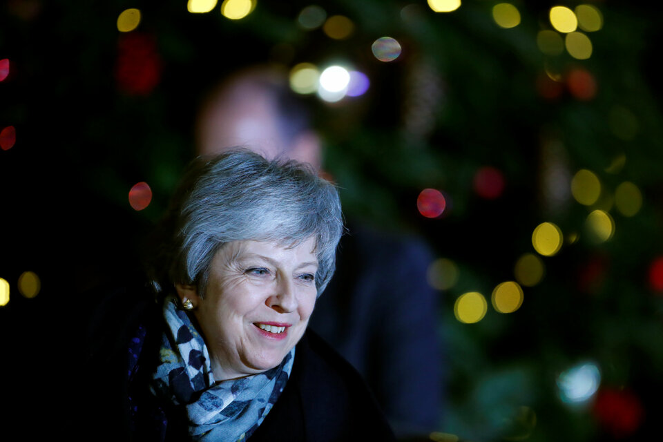 British Prime Minister Theresa May survived a confidence vote by the Conservative Party on Wednesday, but a mutiny by more than a third of her lawmakers indicated parliament was heading towards deadlock over Brexit. (Reuters Photo/Eddie Keogh)