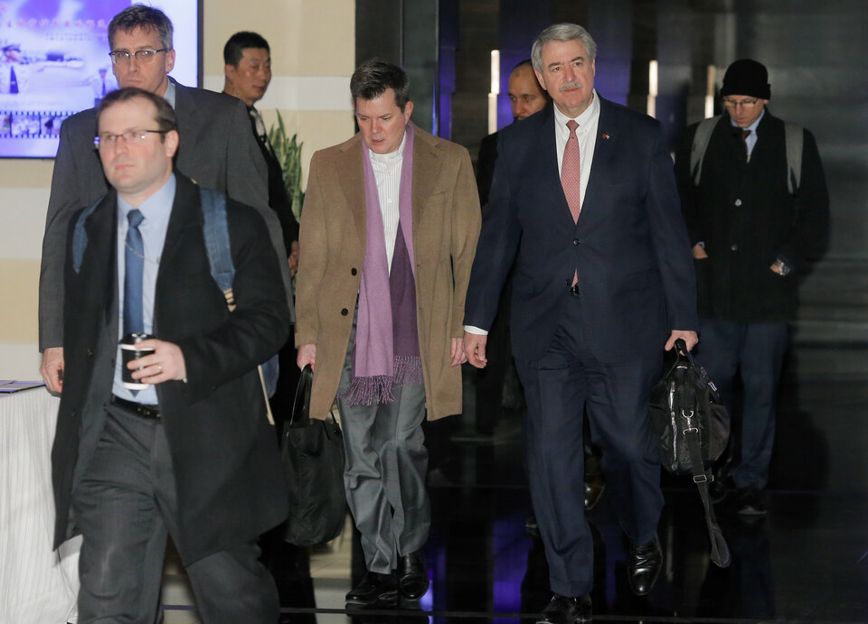 Ted McKinney (2nd R), the US undersecretary for trade and foreign agricultural affairs and a member of the US trade delegation to China, leaves a hotel with other officials in Beijing, China January 7, 2019.  (Reuters Photo/Thomas Peter)
