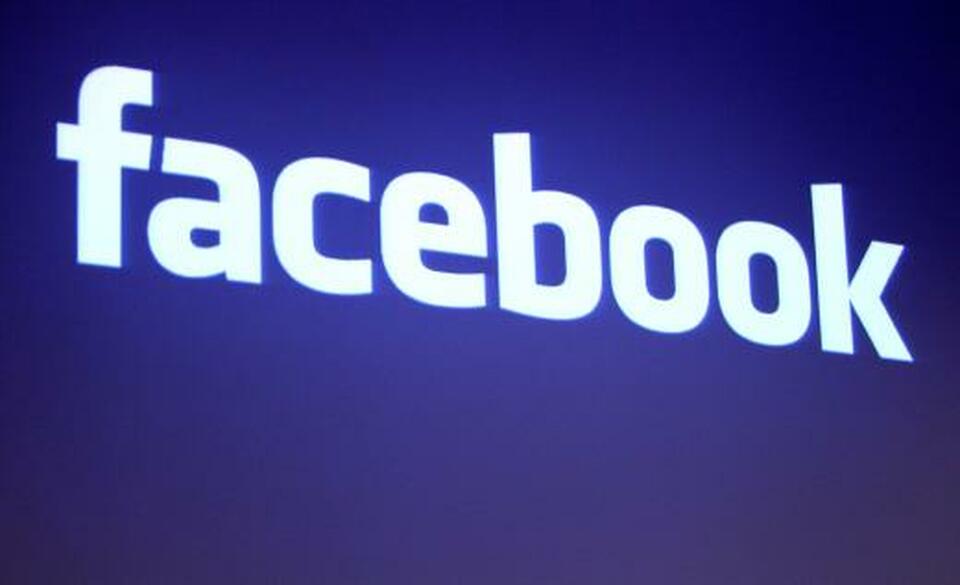 The Facebook logo is shown at Facebook headquarters in Palo Alto, California, US, May 26, 2010.  (Reuters Photo/Robert Galbraith)