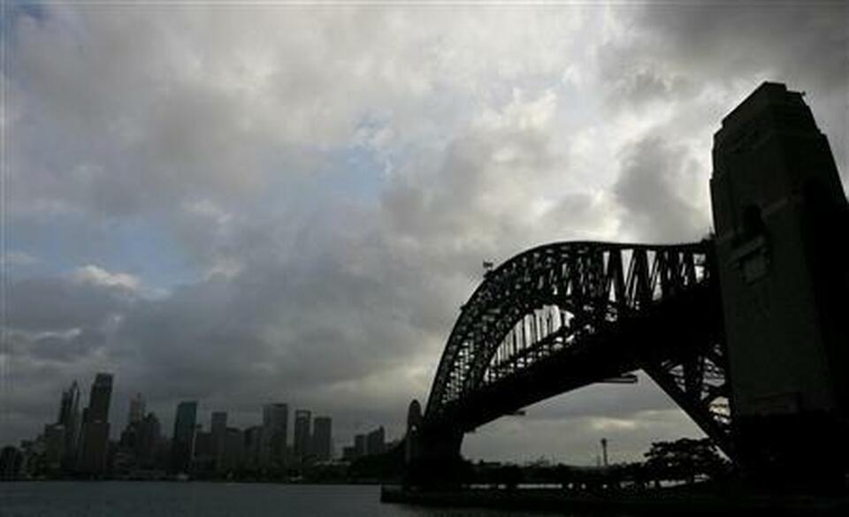 A view of the Harbour Bridge and the central business district in Sydney. (Reuters Photo/Daniel Munoz)
