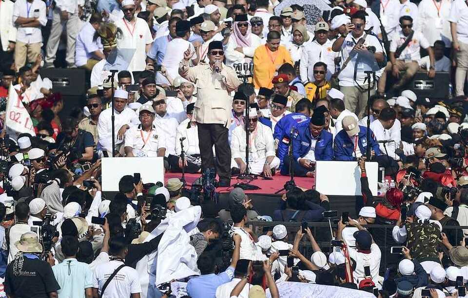 Presidential candidate Prabowo Subianto speaking to supporters during a mass meeting at Gelora Bung Karno Stadium in Jakarta on Sunday. (Antara Photo/Hafidz Mubarak A)