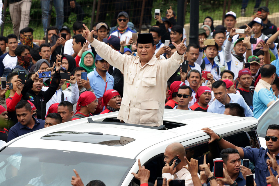Prabowo leaving a May Day rally in Jakarta. (Antara Photo/Rivan Awal Lingga)