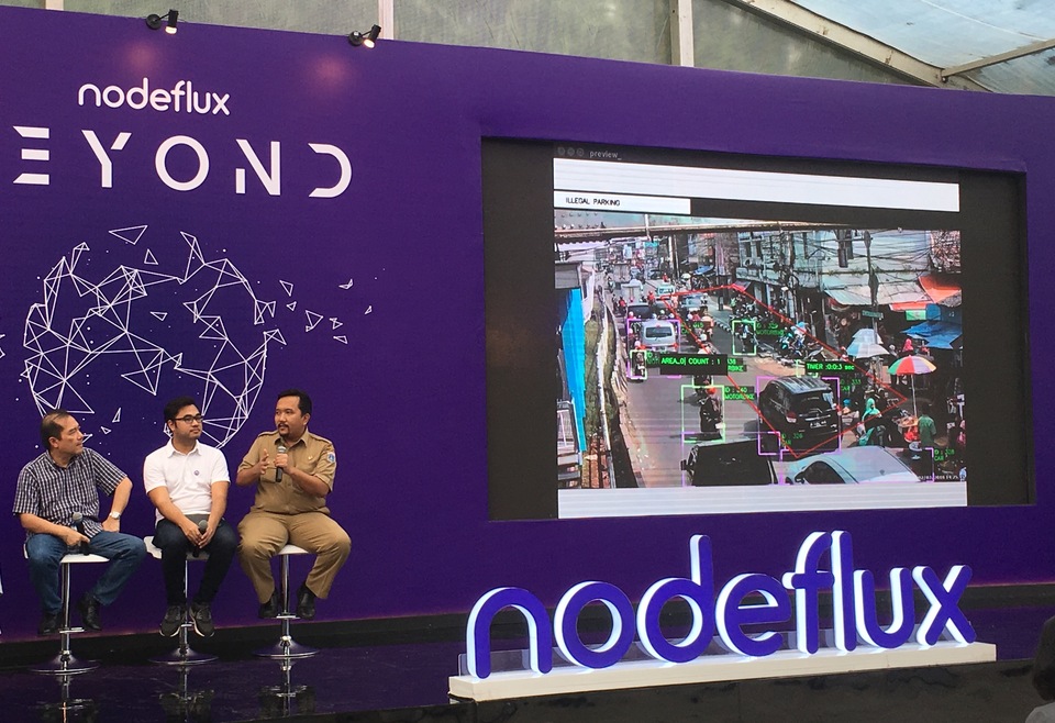 From left to right, head of NVIDIA at Binus University's AI research and development center Bens Pardamean, Nodeflux chief technical officer and co-founder Faris Rahman, and head of Jakarta Smart City's planning, research and development unit Alex Siahaan at the 'Nodeflux BEYOND' event in South Jakarta on Tuesday. (JG Photo/Christian Lee)