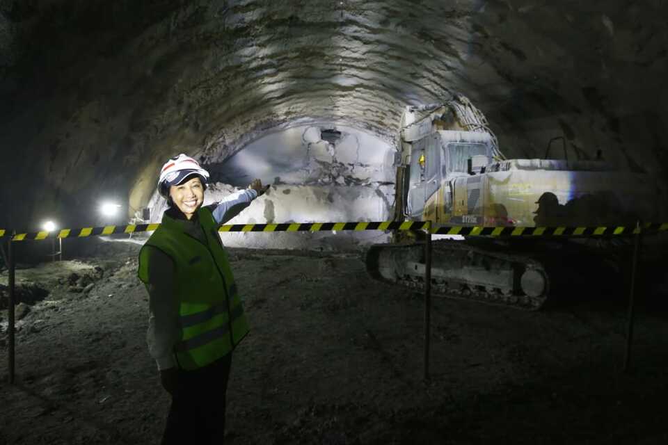 State-Owned Enterprises Minister Rini Soemarno poses in front of a section the Walini Tunnel in West Bandung district, West Java, on Tuesday. (Photo courtesy of the state-owned enterprises ministry)