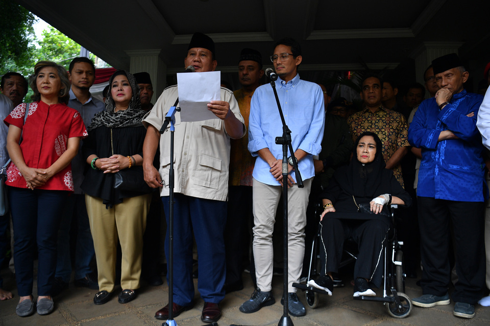 Prabowo Subianto and Sandiaga Uno giving a press conference in response to the announcement of the election results at the former Army general's residence in South Jakarta on Tuesday. (Antara Photo/Sigid Kurniawan)