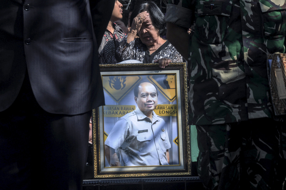 A portrait of Sutopo Purwo Nugroho during his funeral in Boyolali, Central Java, on Monday. (Antara Photo/Aloysius Jarot Nugroho)