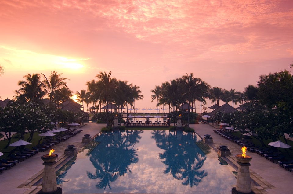 Enjoying the sunset at Conrad Hilton Bali Resort's swimming pool. (Photo courtesy of Conrad Bali)
