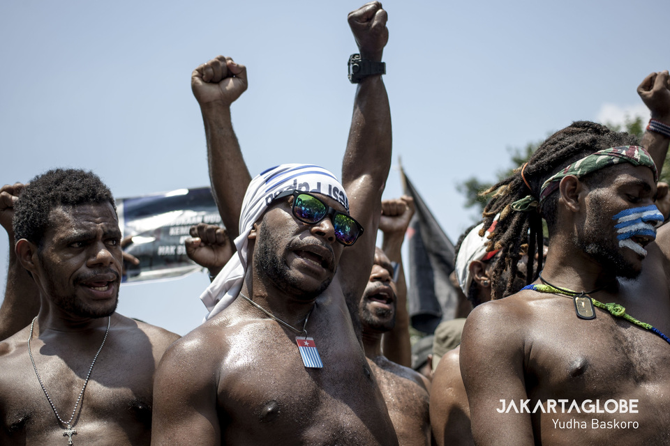 Papuans call for an immediate end to discrimination against them, during a protest at the National Monument (Monas) in Central Jakarta on Thursday. (JG Photo/Yudha Baskoro)
