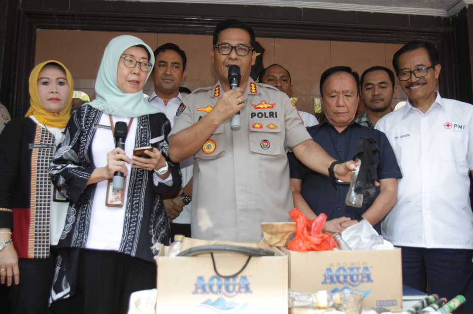 Jakarta Police spokesman Chief Comr. Argo Yuwono, center. (Antara Photo/Reno Esnir)
