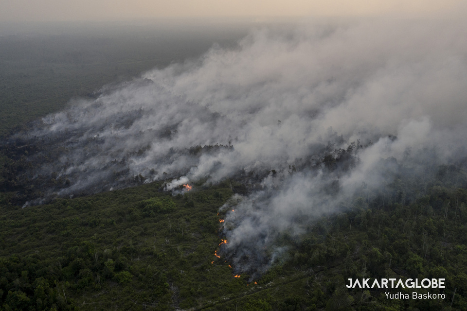 Aerial view of hotspots during forest fires at Petuk Katimpun, Jekan Raya near Palangka Raya in Central Kalimantan on Sep. 29, 2019. (JG Photo/Yudha Baskoro)