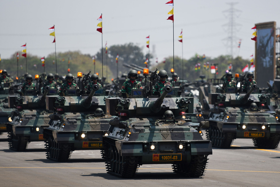 Indonesian Army soldiers parade with armored vehicles during the 74th TNI Anniversary celebration at Halim Perdanakusuma Air Force Base, East Jakarta, on Saturday, Oct. 5, 2024. (ANTARA FOTO/M Risyal Hidayat).